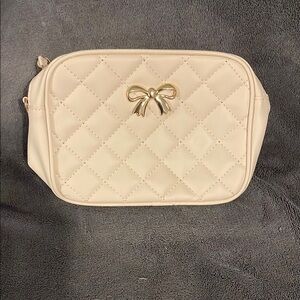 Elegant White Quilted Bag with Gold Bow